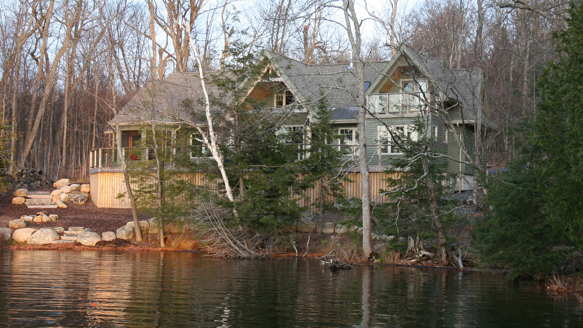 architect designed new lakefront cottage - parry sound - lake side view